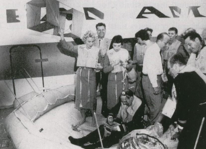 1959 Pilots & stewardesses practice sea ditching drills in a mock up at New York JFK airport.